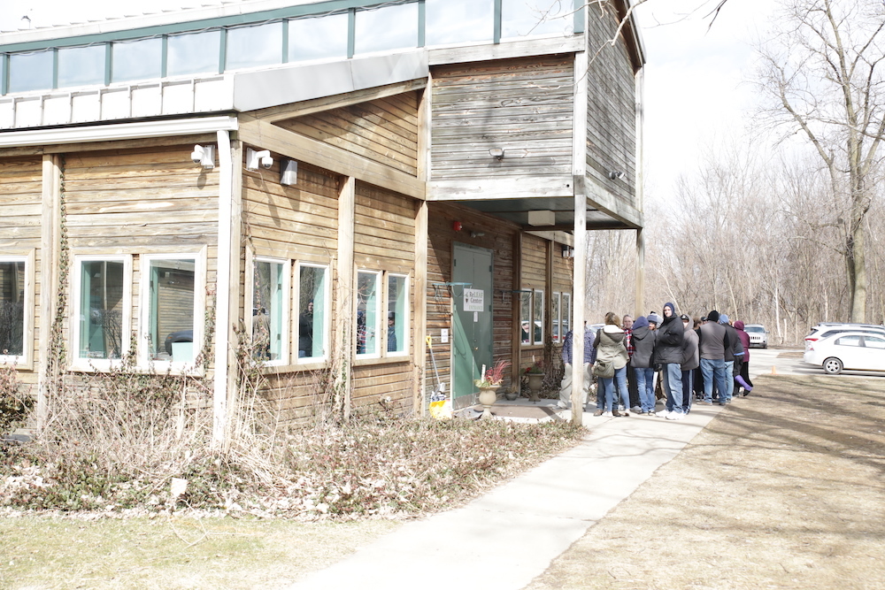 Cannabis consumers line up outside the Releaf Center in Niles, MI