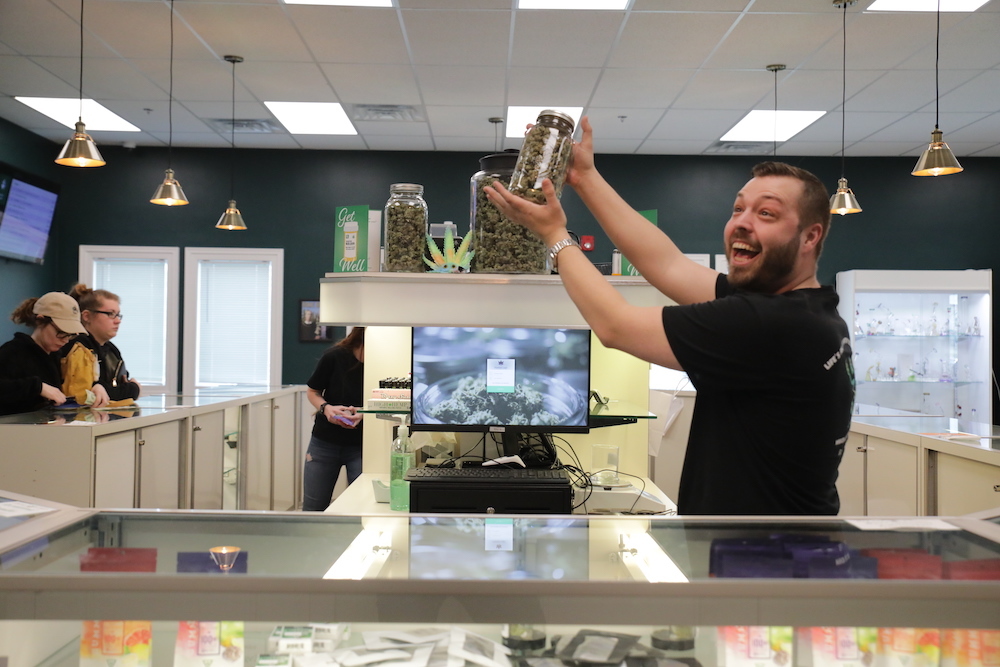 George, GM of the Releaf Center helps customers purchase cannabis in Southwest Michigan